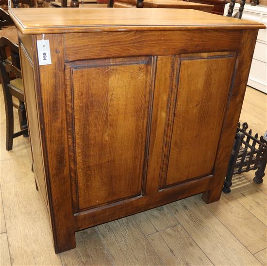 A French panelled oak cabinet W.94cm